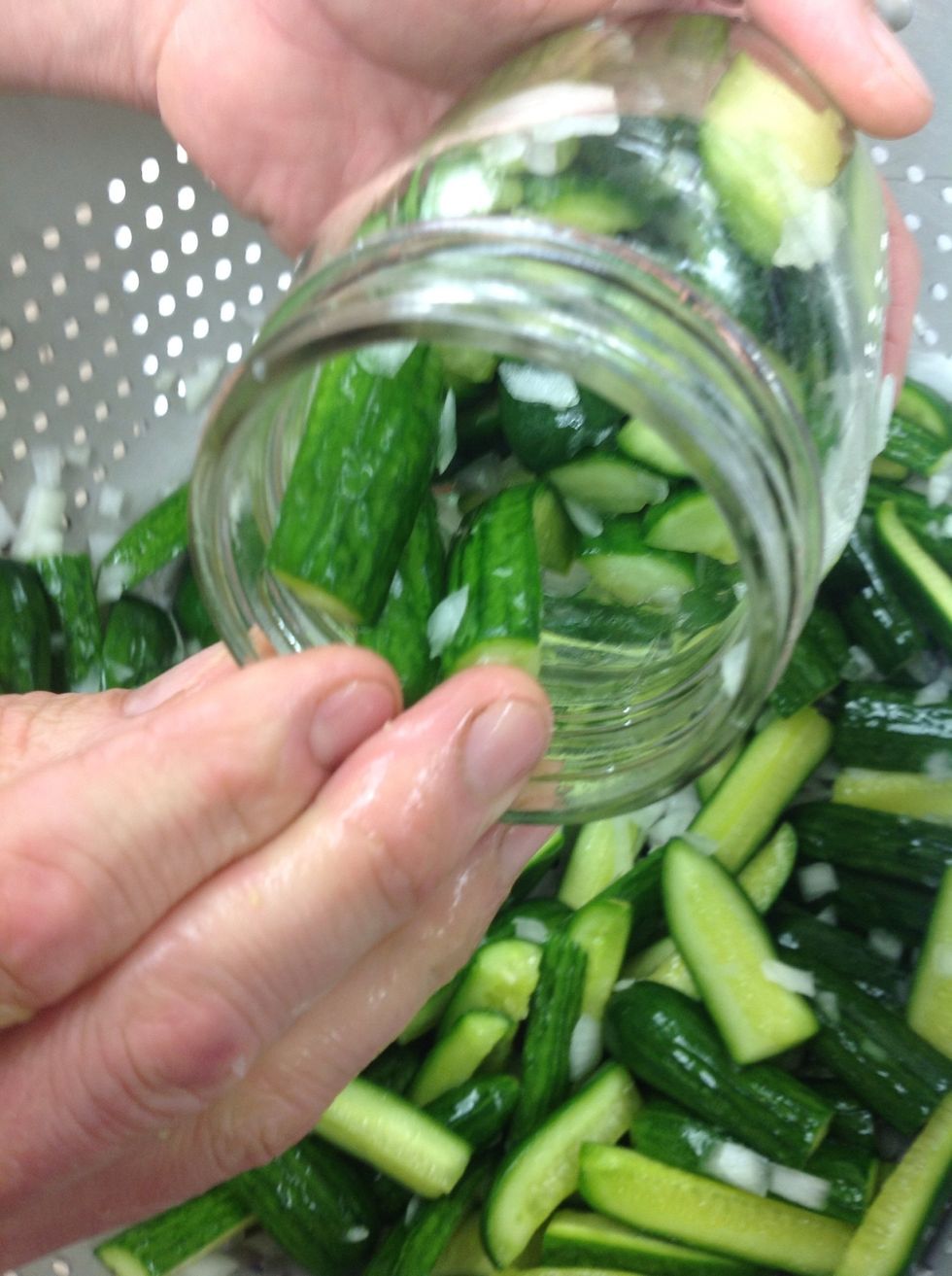 Fill jars with pickles and onions