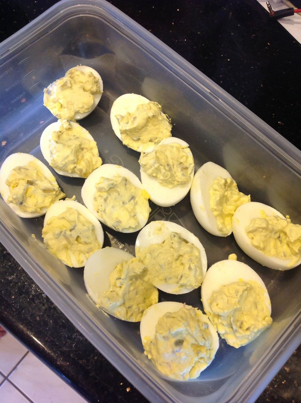 Fill platter or container with filled eggs