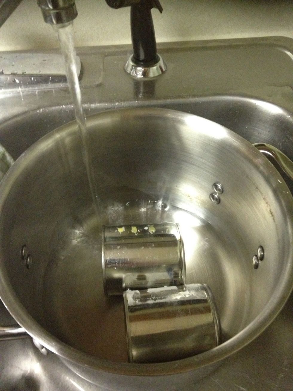 Fill pot with water. Make sure that cans are completely covered at all times!