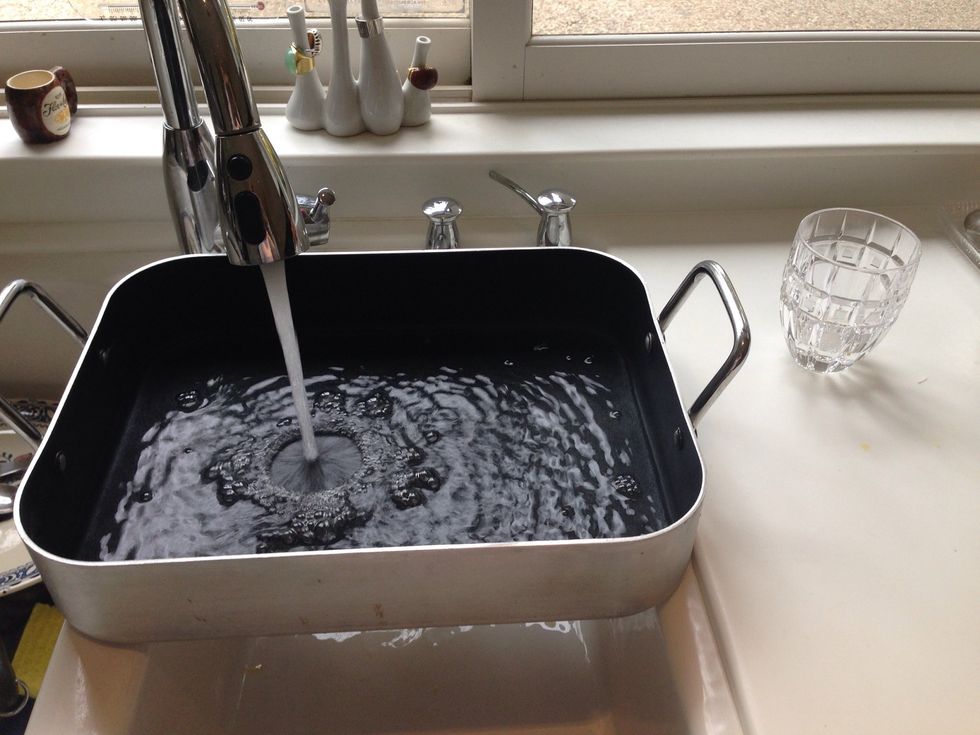 Fill rectangle deep dish with water about half way and set aside