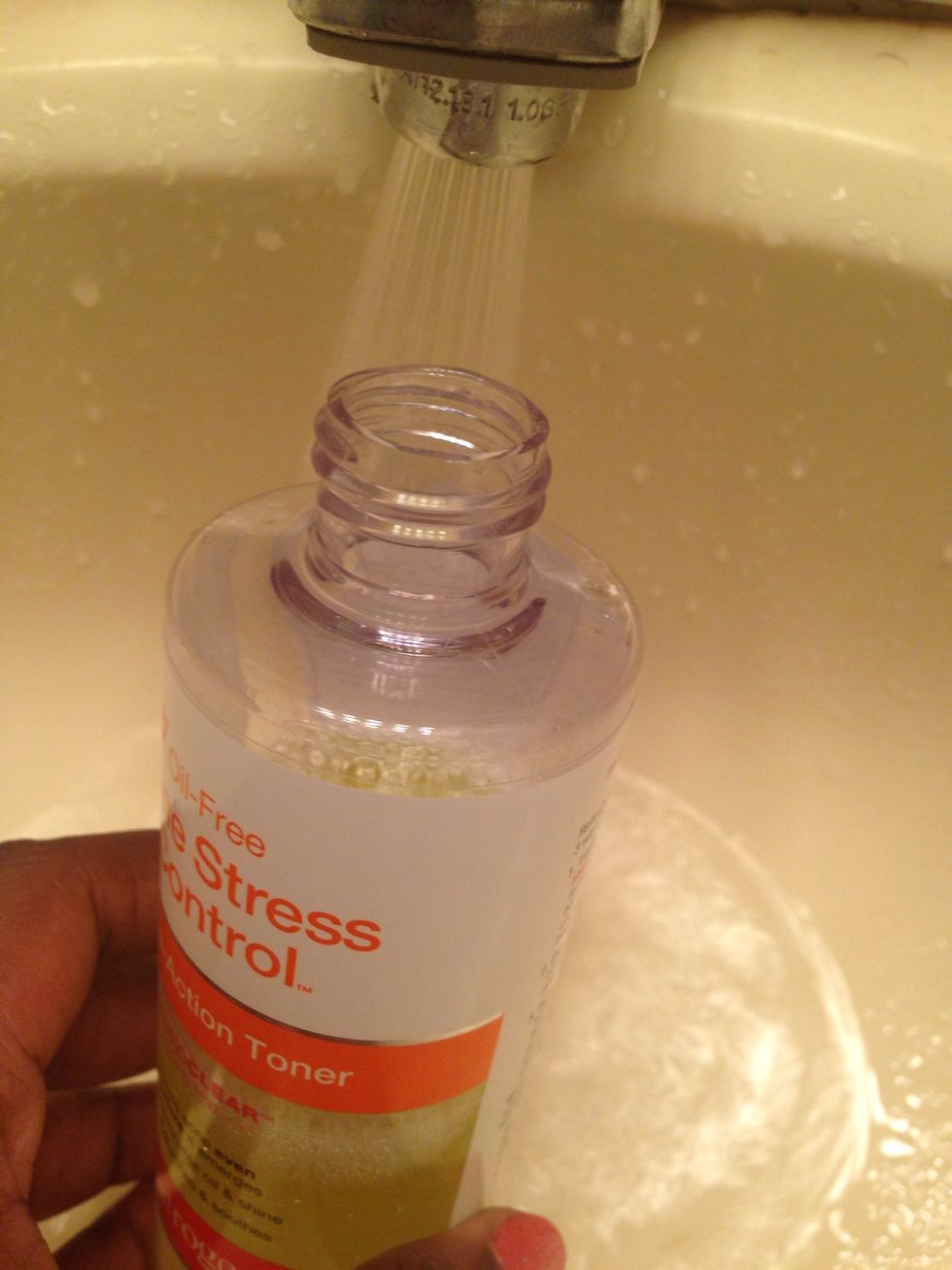Fill rest of the way with water leaving room to shake the ingredients until well mixed