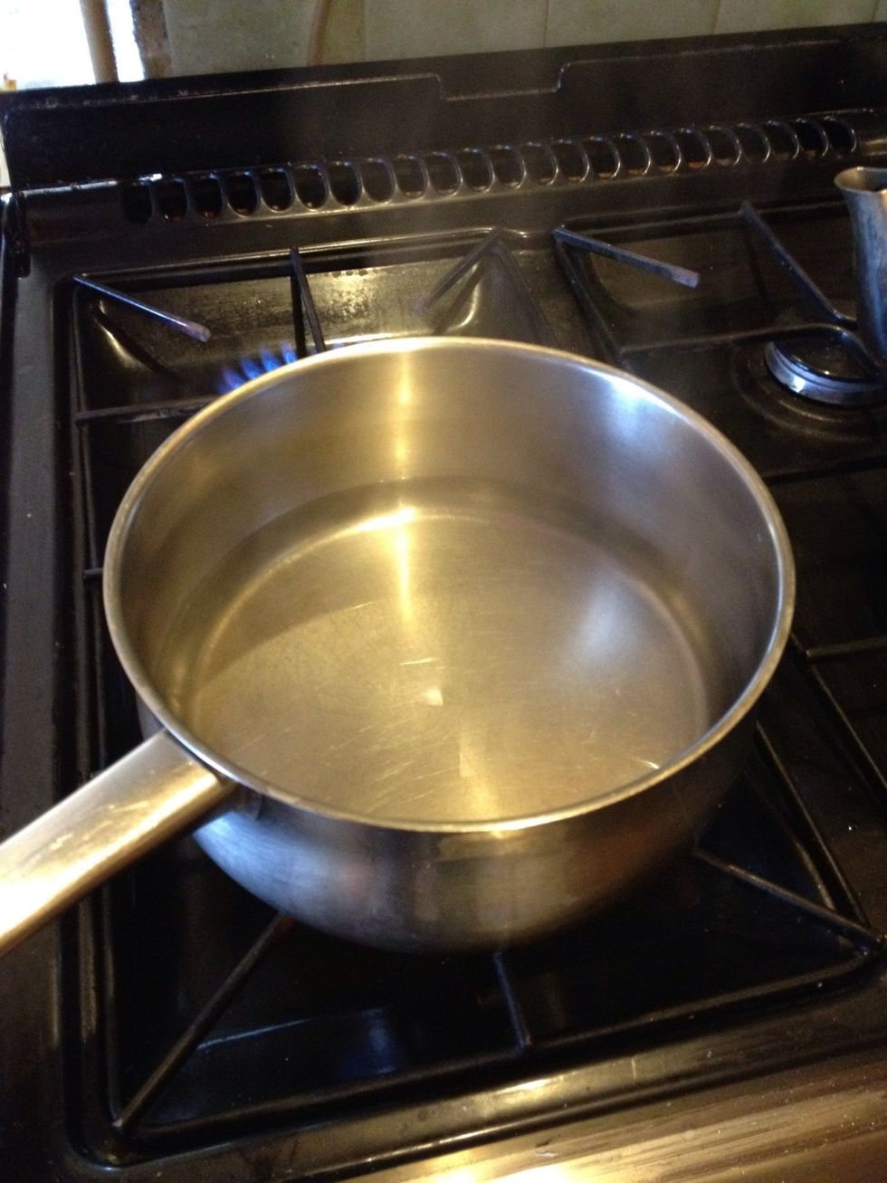 Fill saucepan with water to about 2cm deep, place lid on pan and bring to the boil.
