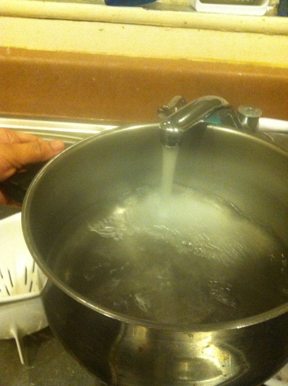 Fill the boiler with water, less than half. After filling the water in the pot start heating up the water to a boil. While waiting for the water heat up lets get the zucchini cut up\u27a1
