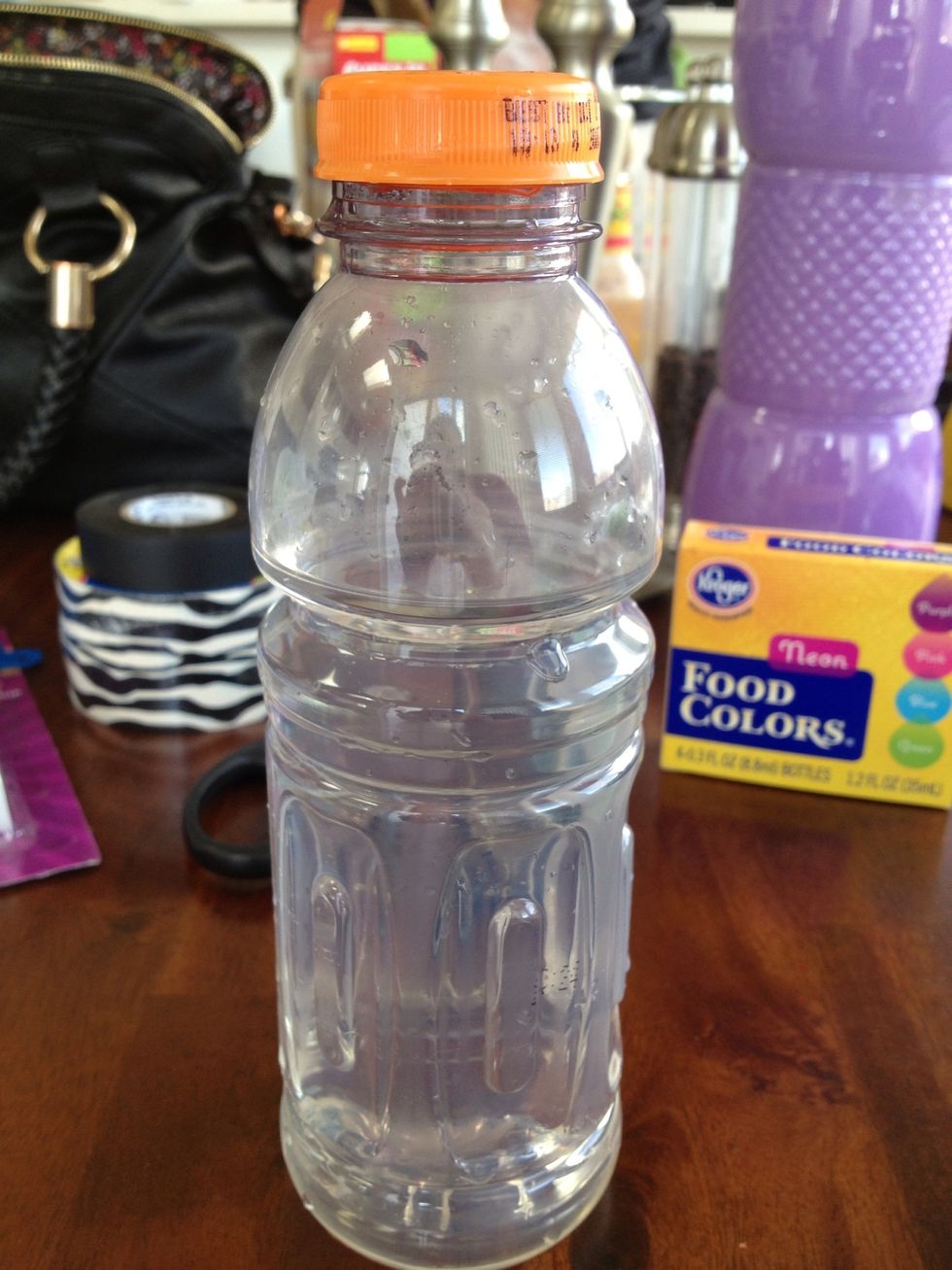 Fill the bottle 3/4 of the way with water (leaving space to shake it up later).