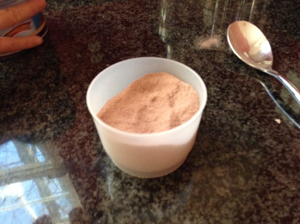 Fill the bowl with hot chocolate powder.