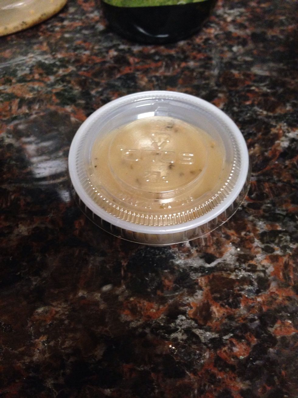 Fill the container with dressing and close the lid. I don't normally fill the container to the top because I like very little dressing. The dressing in picture is a Caesar Vinaigrette. Pretty tasty!