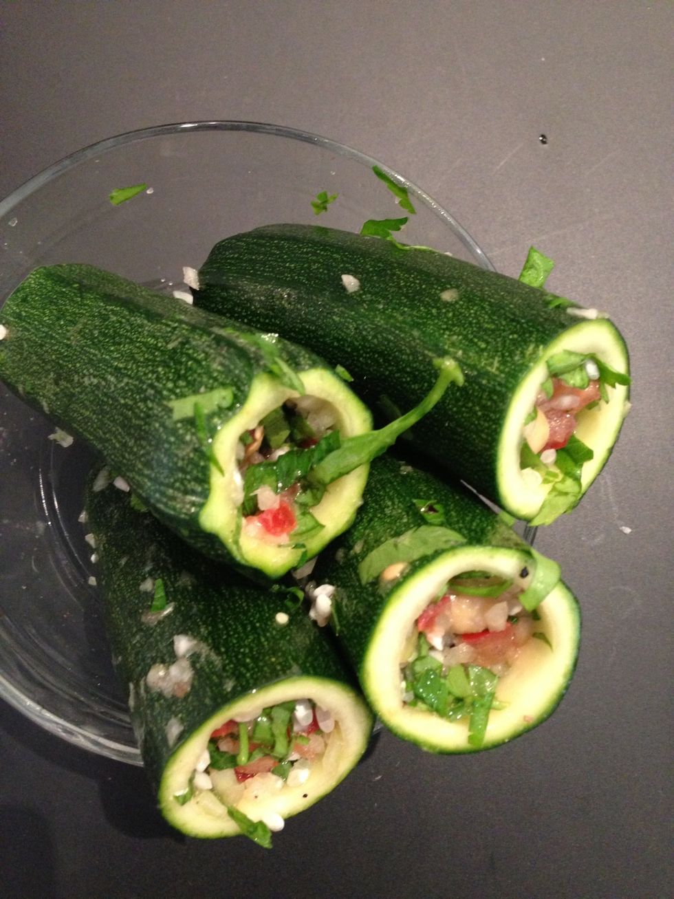 Fill the courgettes.