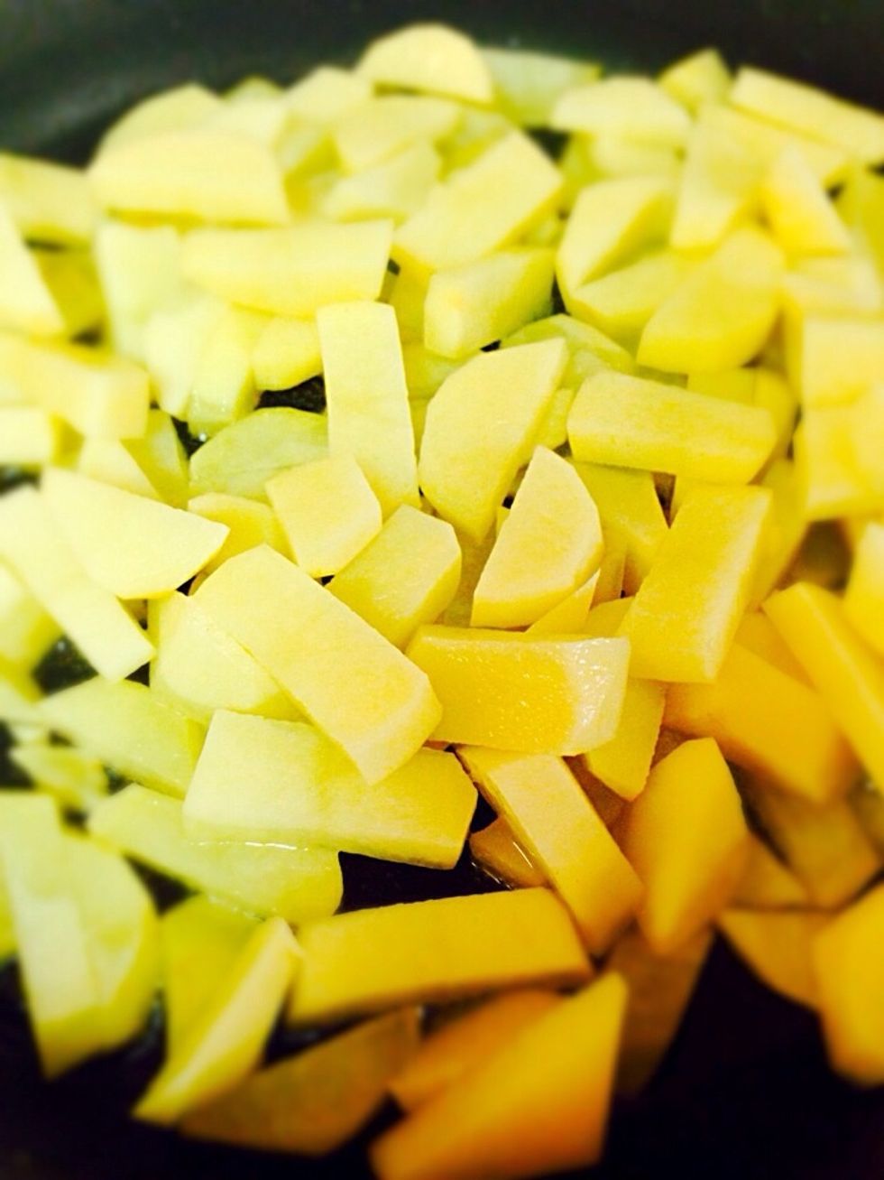 Fill the frying pan with oil just to cover the bottom then add the potatoes