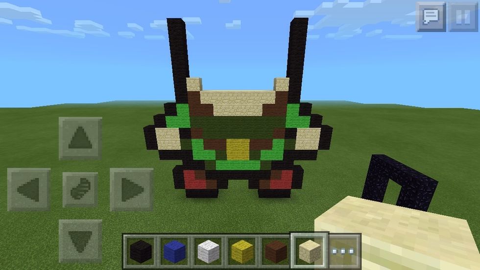 Fill the gap between the two browns with sandstone, and place one on top.