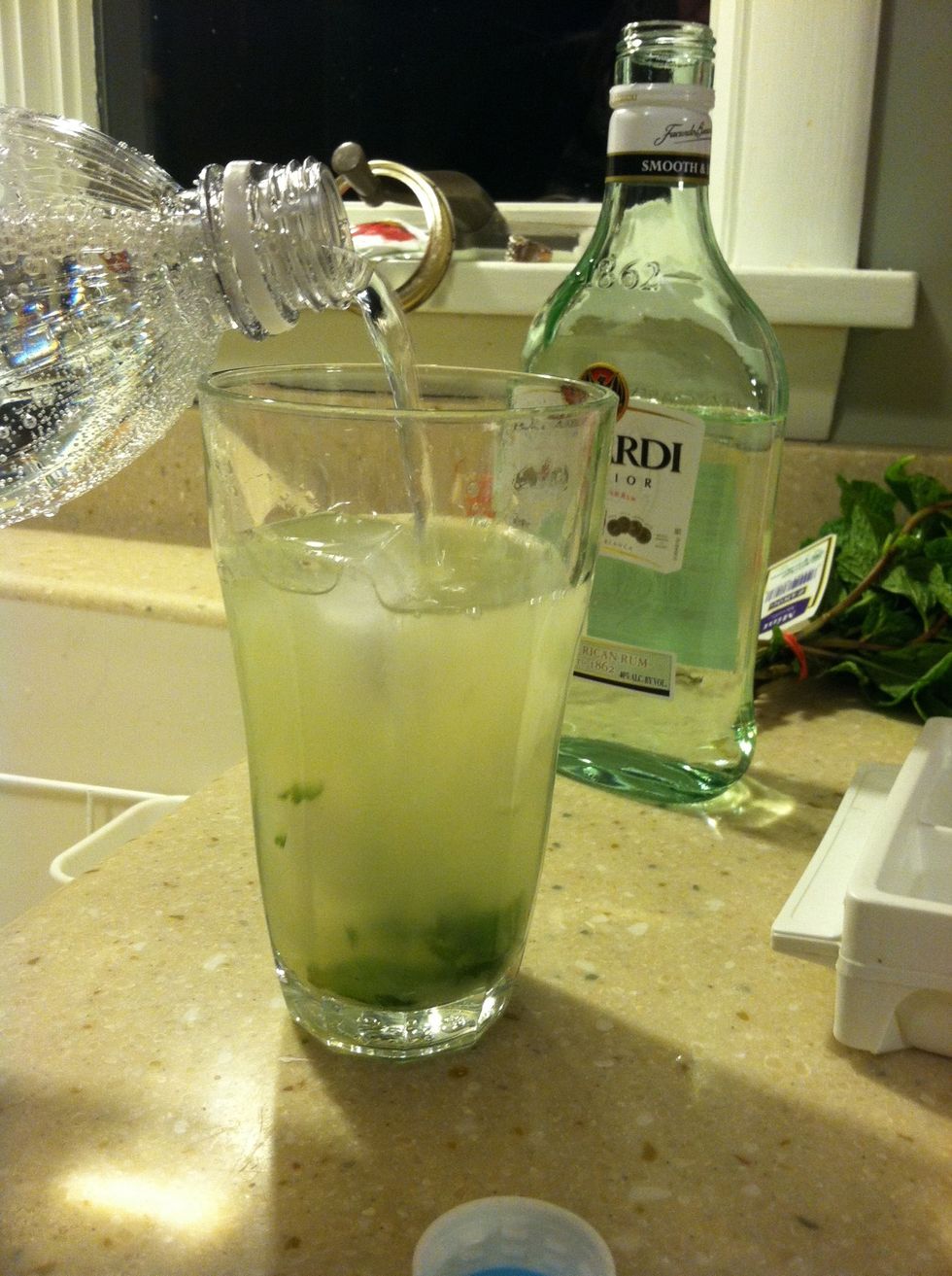 Fill the glass the rest of the way with club soda