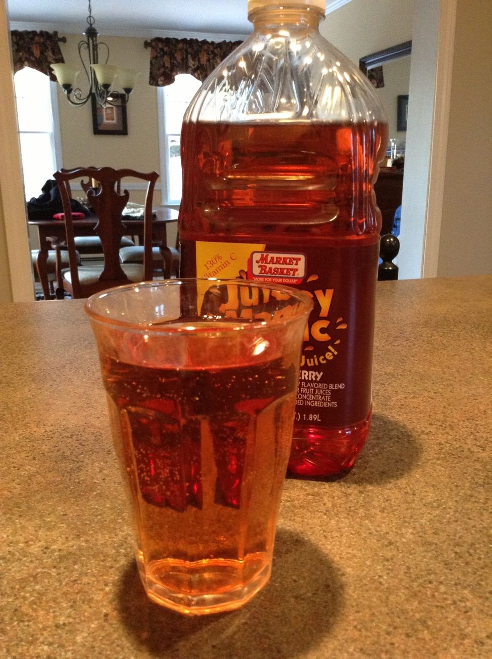 Fill the glass to the top with juice.