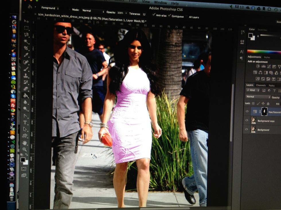 Fill the image (outside the dress) you will see every thing other than the dress has gone back it its original colour. Basically we did a image mask.