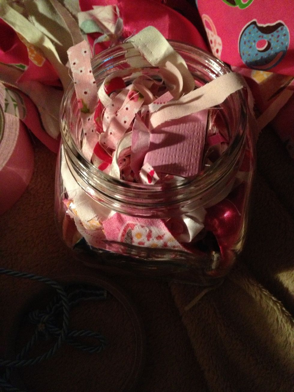 Fill the jar with scraps to hide the box