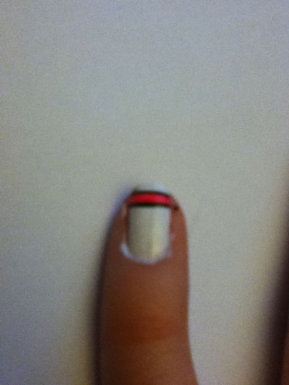 Fill the middle of the lines with pink nail polish.