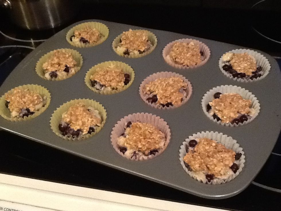Fill the muffin tin. 12 muffins about 3/4 full. Top with a bit of the topping mixture. Bake for 20-22 minutes.