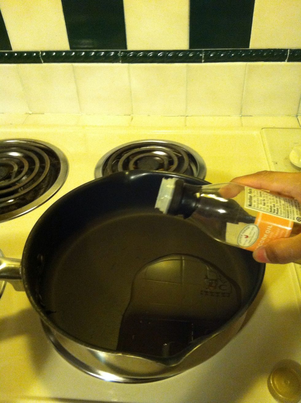 Fill the pan exactly one popcorn kernal deep