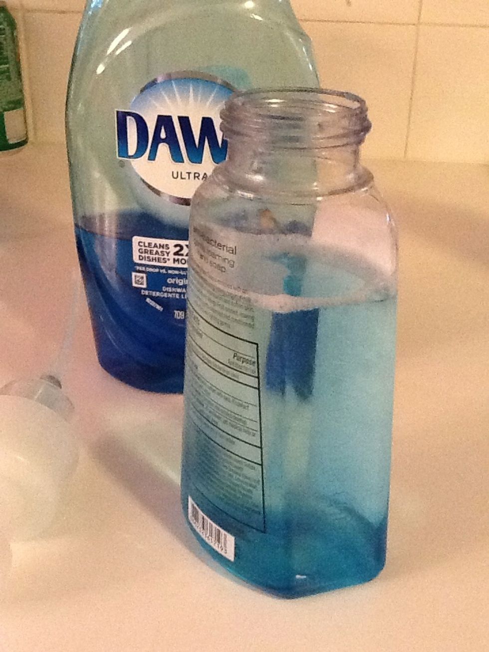 Fill the rest with water. Leave room for the large pump. You also want a little air space because it is easier to mix the soap in. Put the lid back on tight and give a little shake.