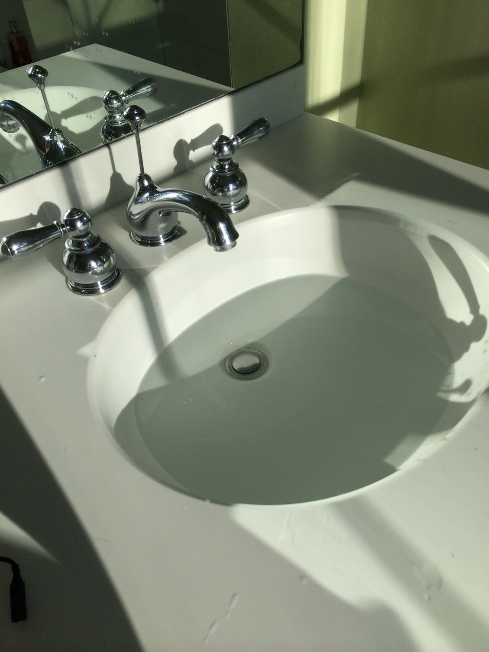 Fill the sink with water.