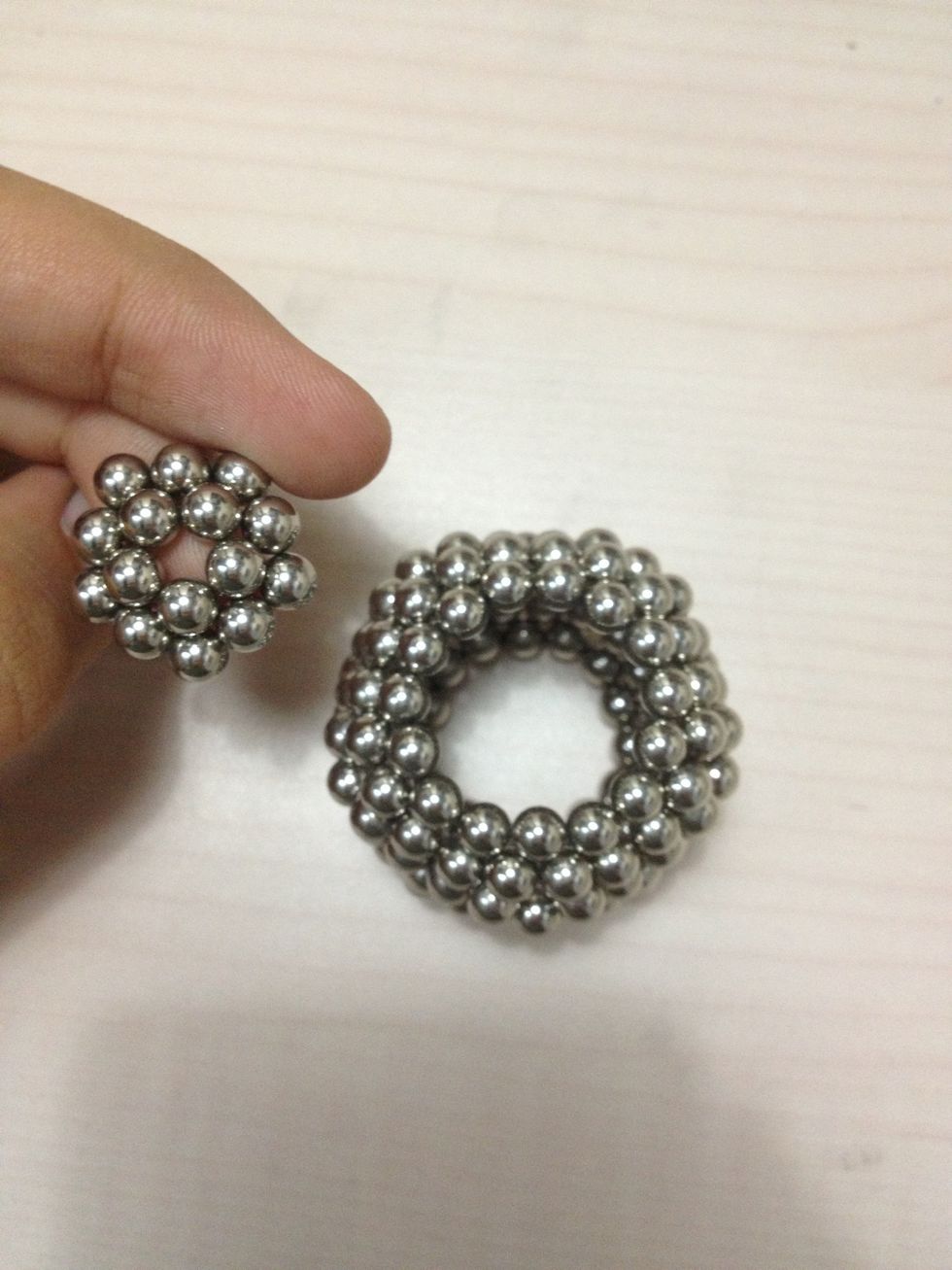 Fill the top gap with one ring of 15 magnets