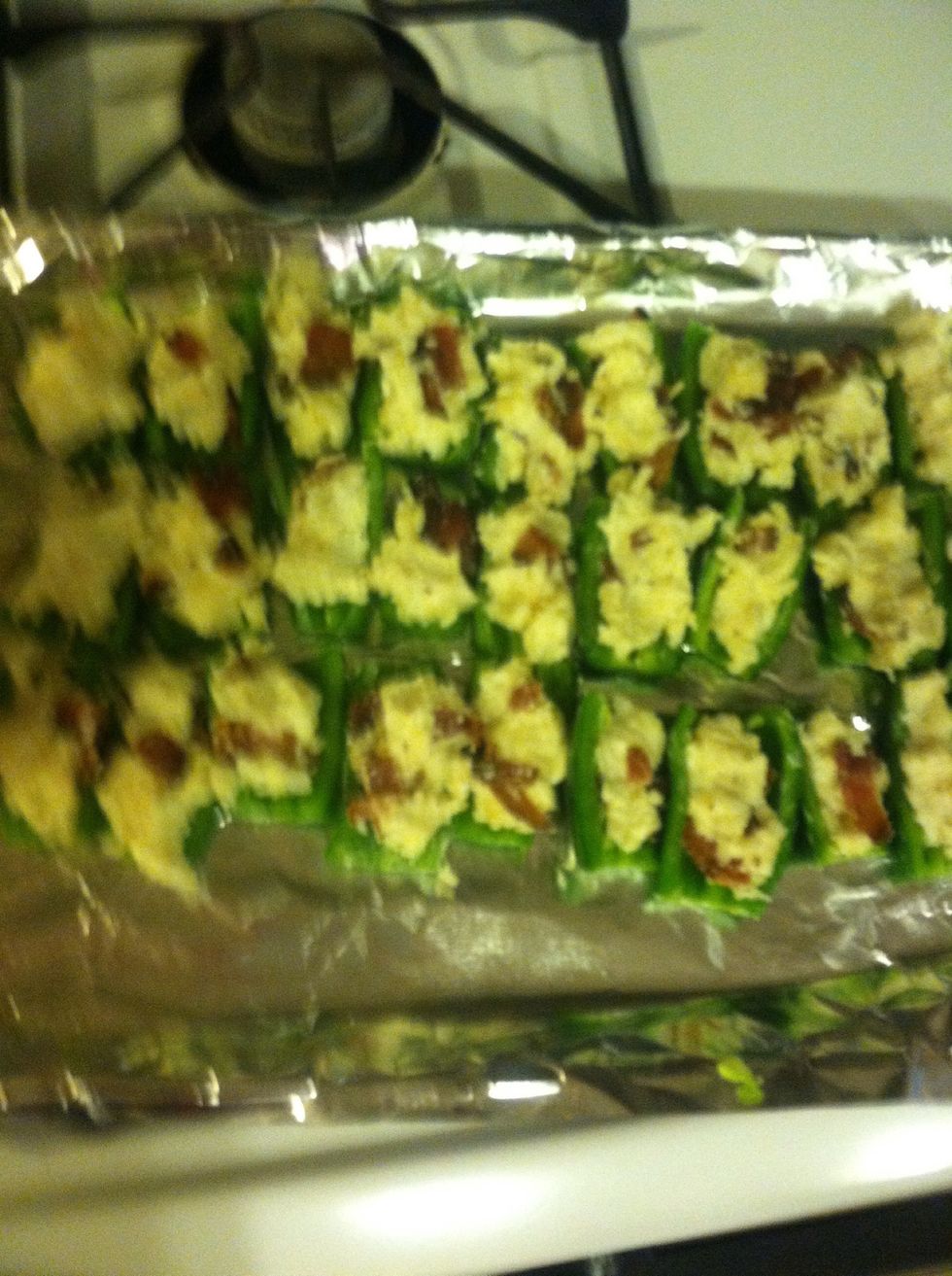 Fill them all up until you have no more cheese mixture.