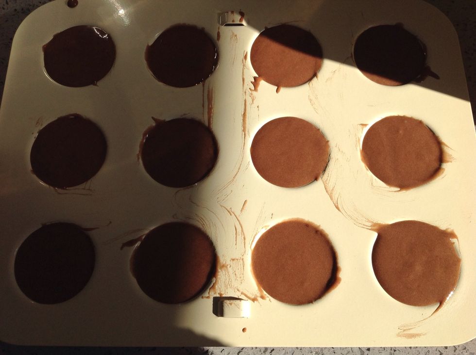 Fill to the top with batter. Try not to get a lot of batter outside of the holes.