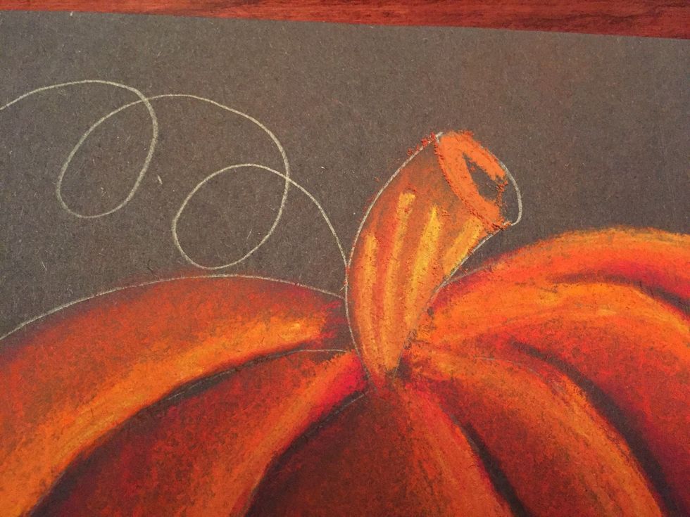 Fill top of oval with brown.