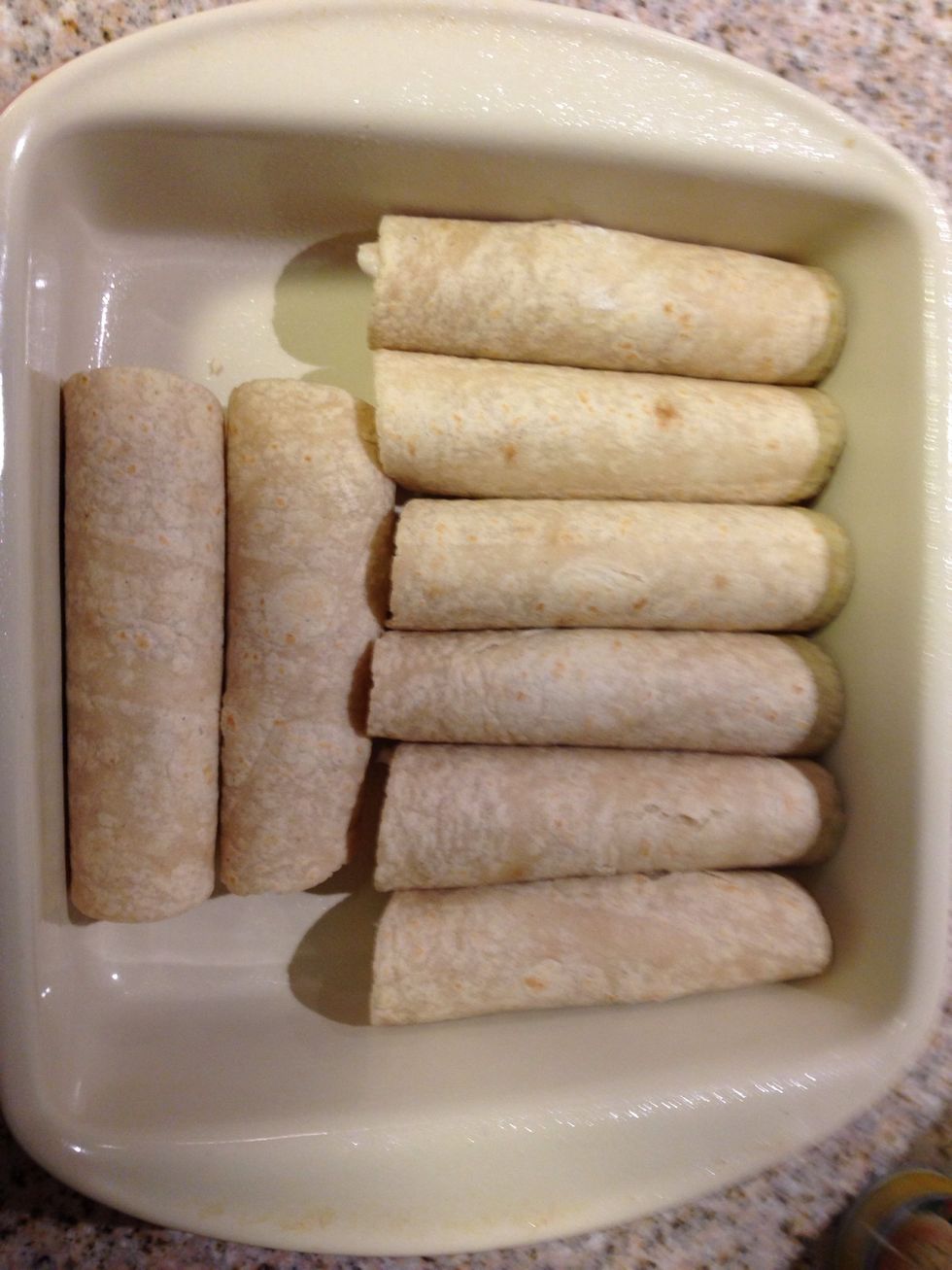 Fill up baking dish with enchilada rolls