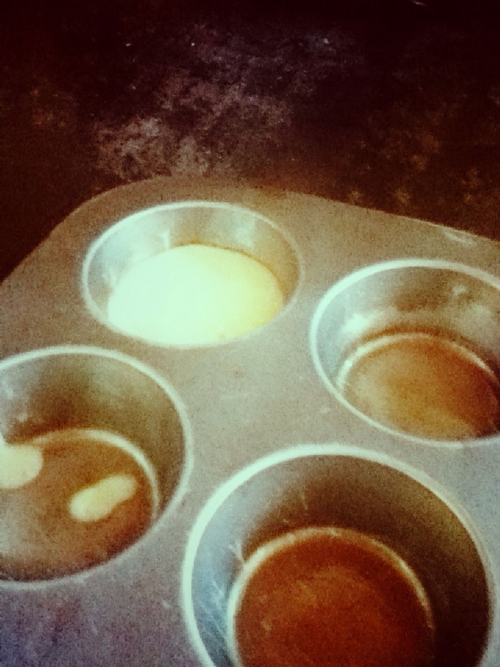 Fill up each of the cups in your muffin pan to about two-thirds capacity.