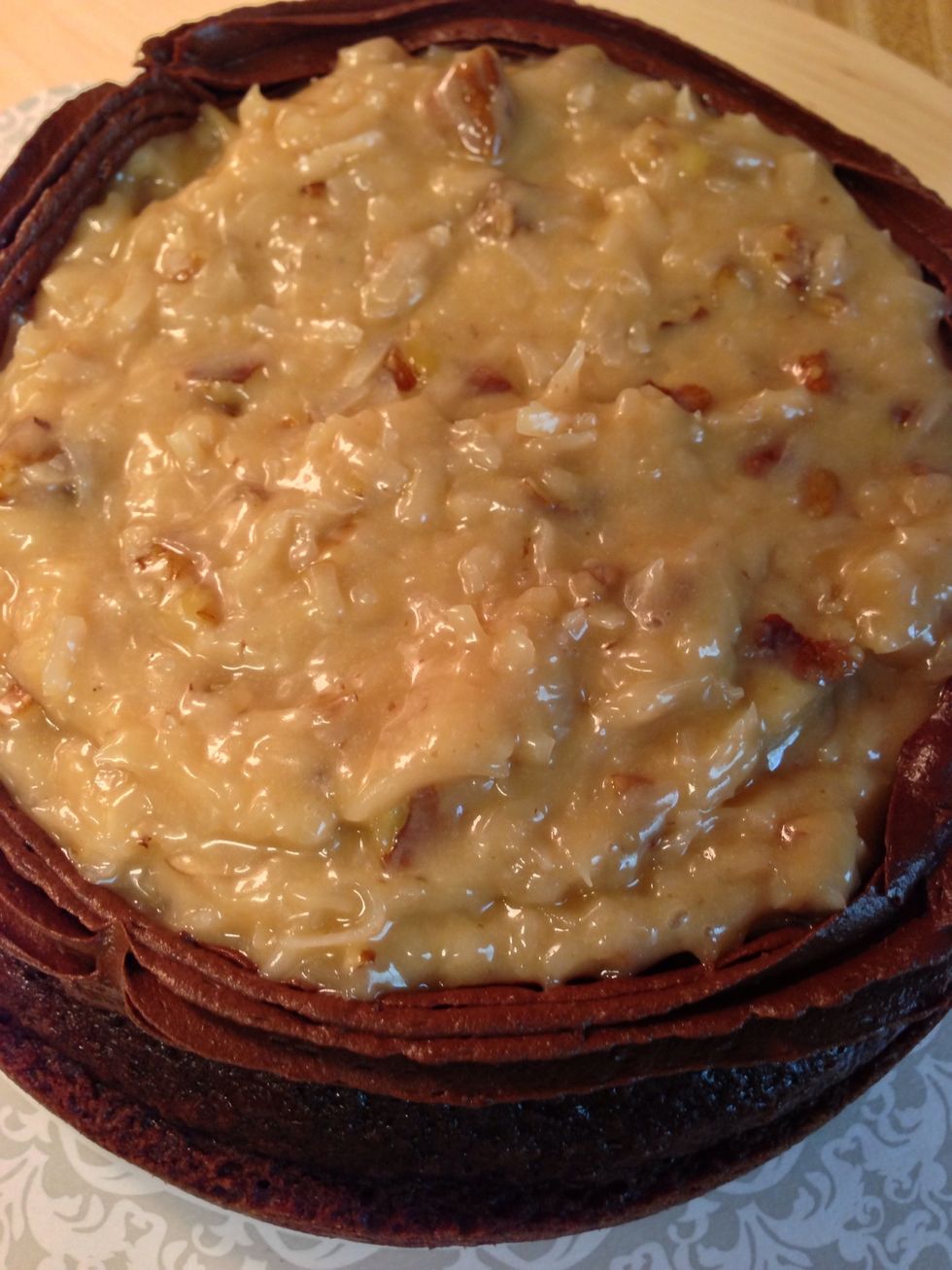 Fill up the inside area of your cake with the coconut-pecan filling. Spread it evenly and resist the urge to taste it at this point!