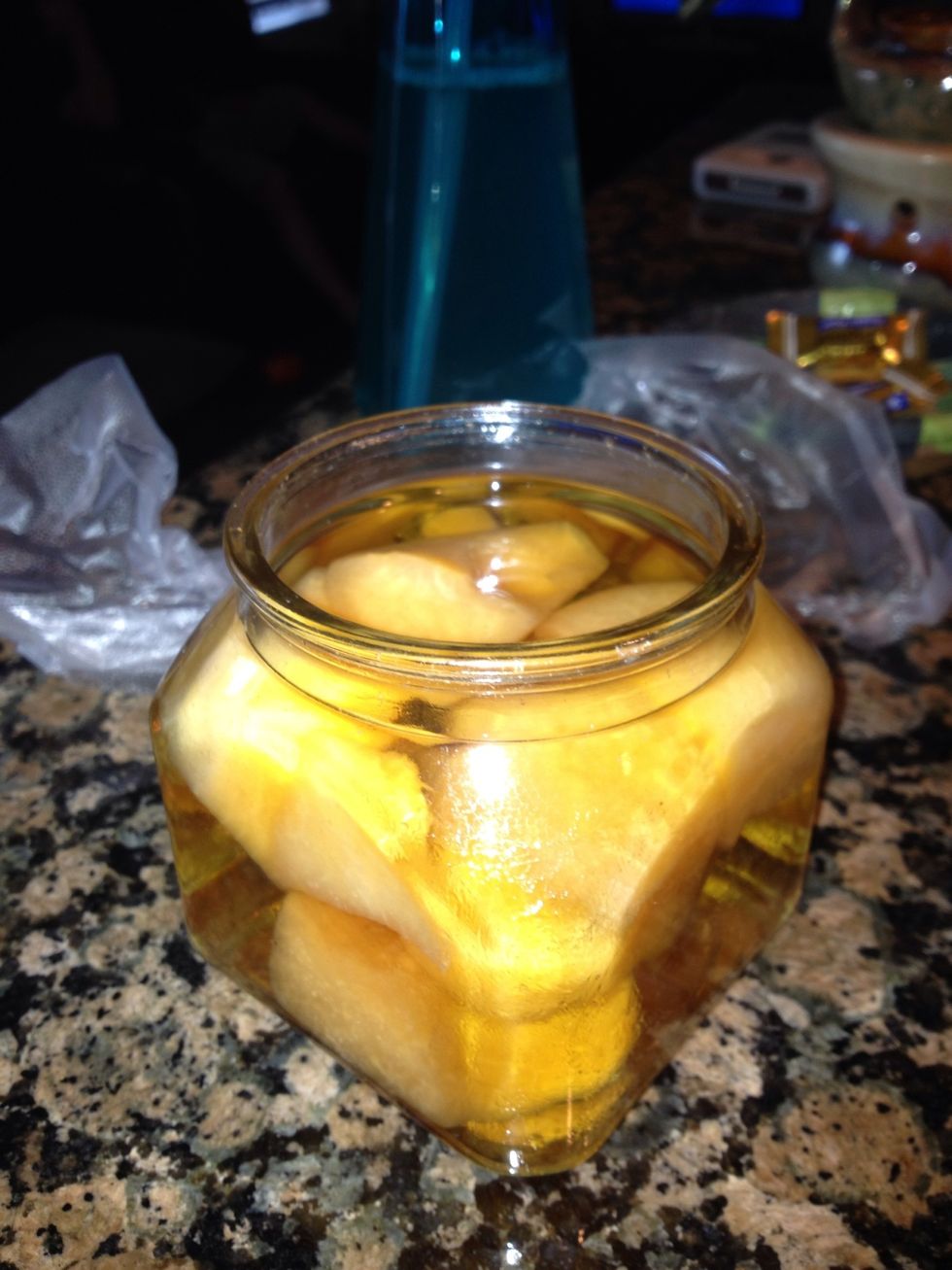 Fill up the jar with apple cider vinegar and cantaloupe chunks. Leave 1/4 inch space at the top.