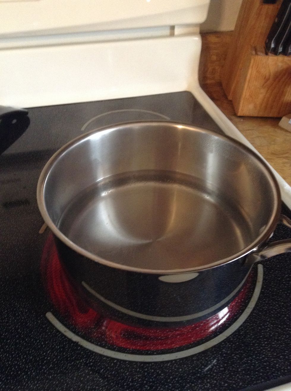 Fill water pan half full. Bring to nearly boiling the turn it down a little lower