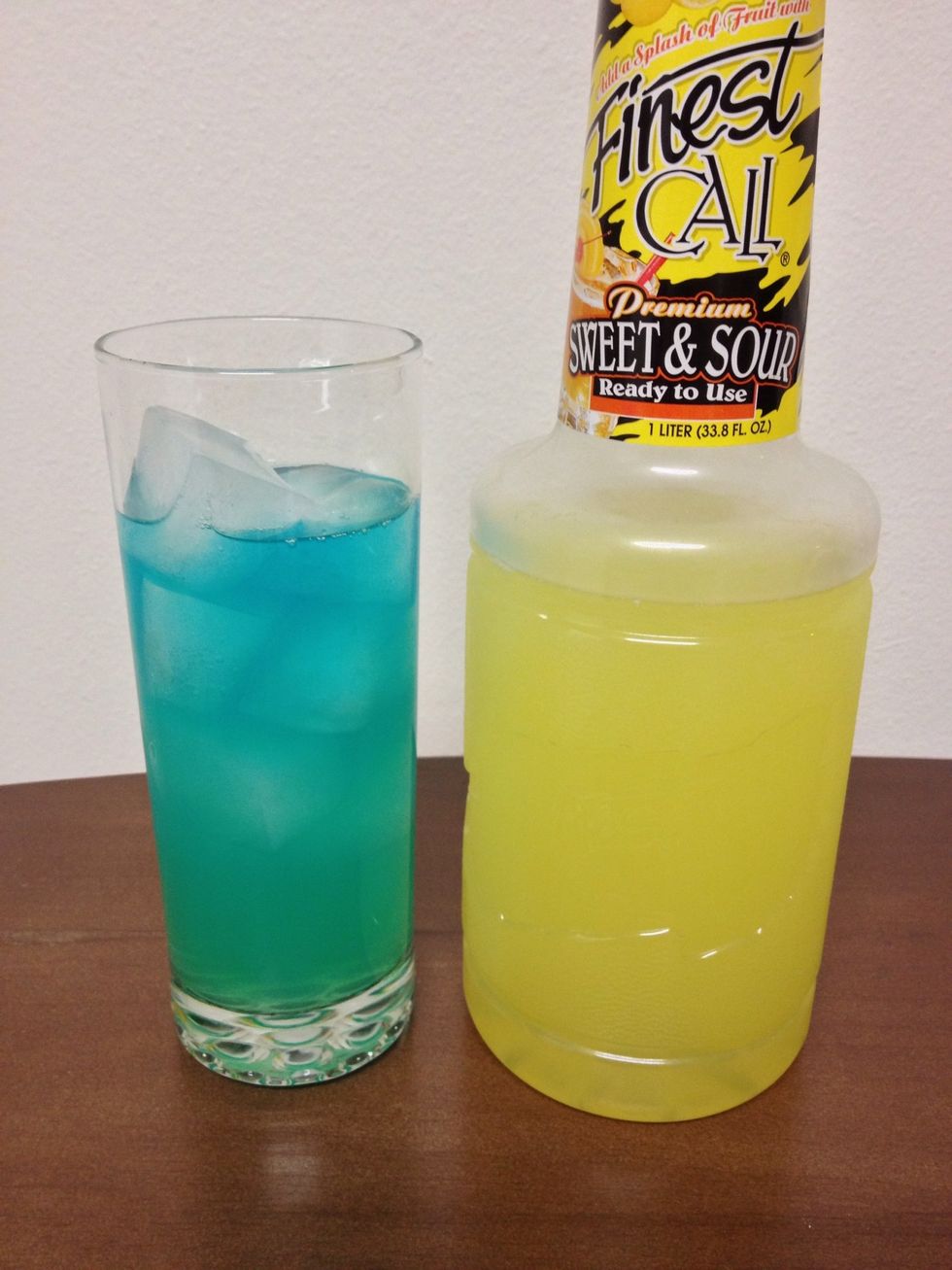 Fill with 2 1/2 ounces of Sweet & Sour Mix.