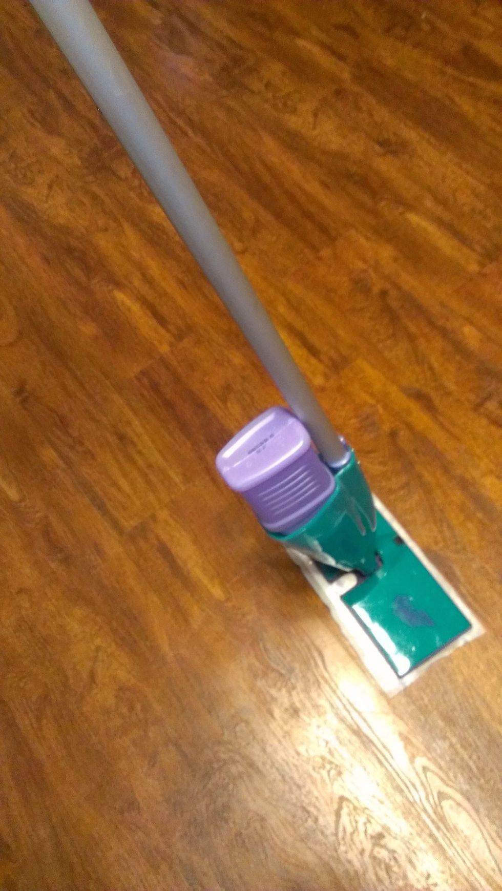 Fill with the solution I have listed in the supplies. Or fill with your favorite floor cleaning solution. Put the lid back on and your ready to mop.