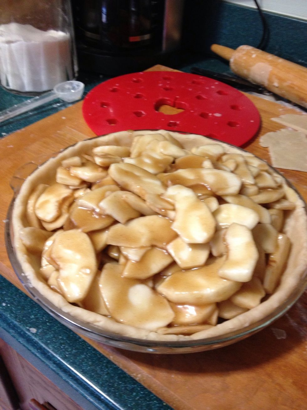 Fill with topping of your choice, then roll out the top just like you would the bottom and roll over the filling and pinch the two crusts together. And make sure to cut slits into the top crust!