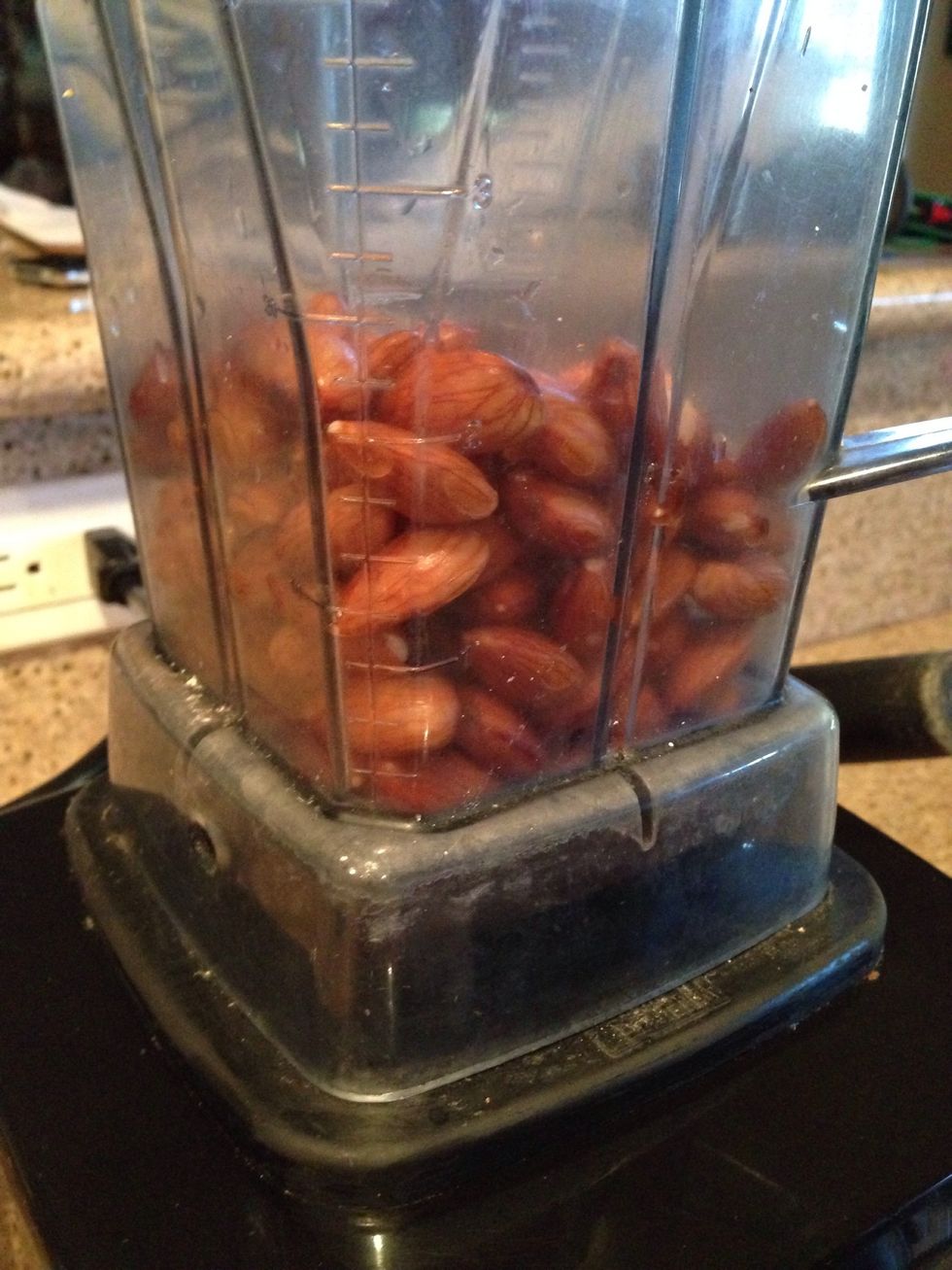 Fill your blender with about 2 cups almonds at a time. For 1 cup of Almonds you will add 2 cups of water. You can adjust the amount of water depending if you like it thinner or thicker.