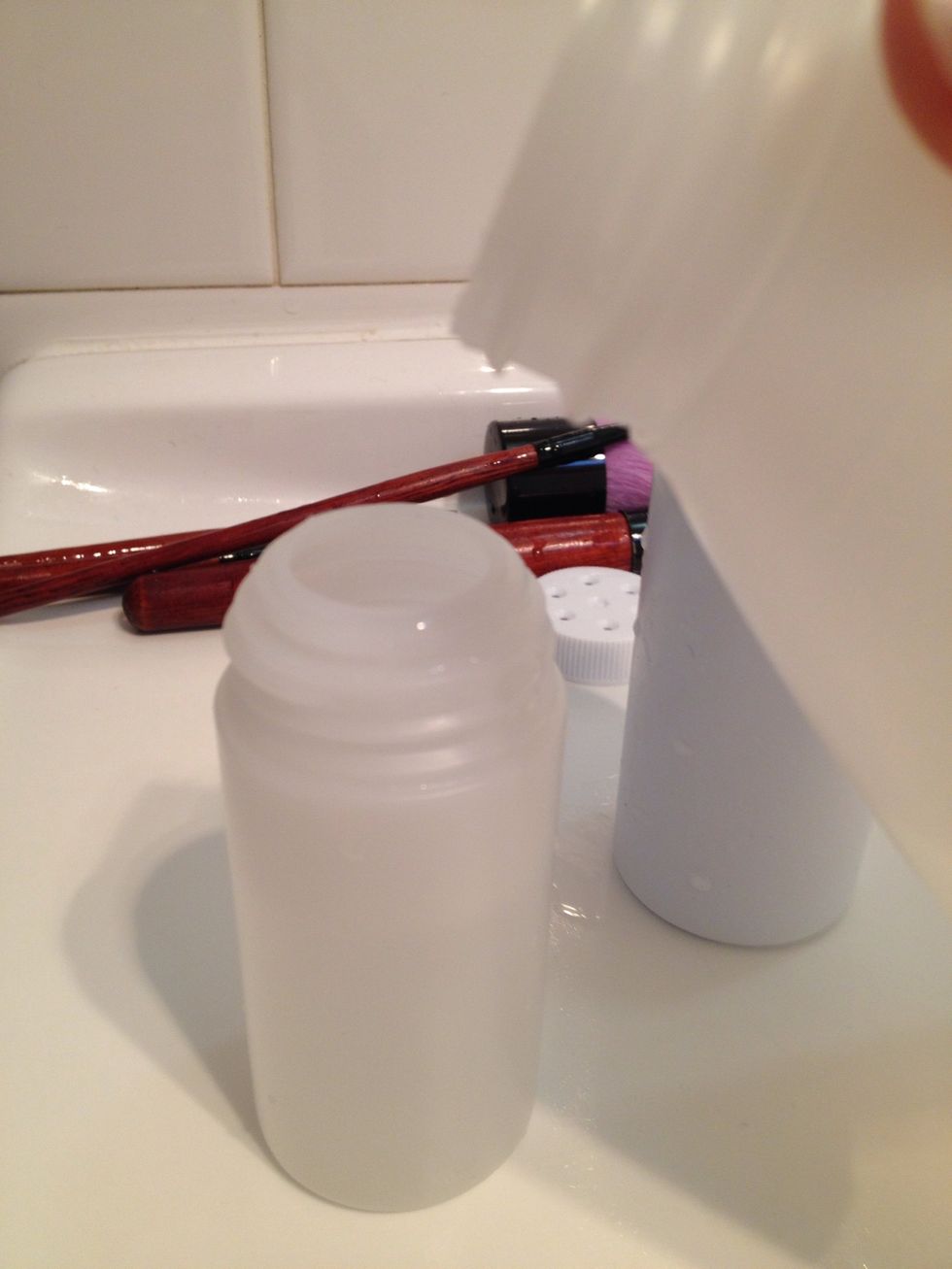 Fill your bottles with vinegar and let them soak a while. If you have several items, you can soak them in a large container or tub.