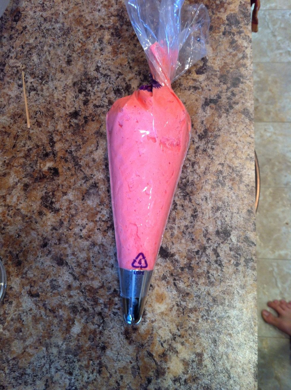 Fill your icing bags. For the roses, I used a 2d Wilton tip.