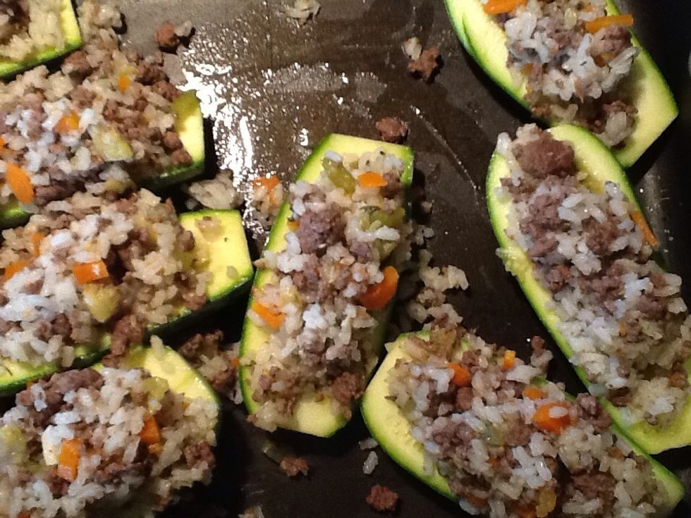 Fill your Kusa boats with mixture. You will have rice mixture left over, spread mixture into bottom of baking pan which has been greased with olive oil lightly. Lay the Kusa boats on top.