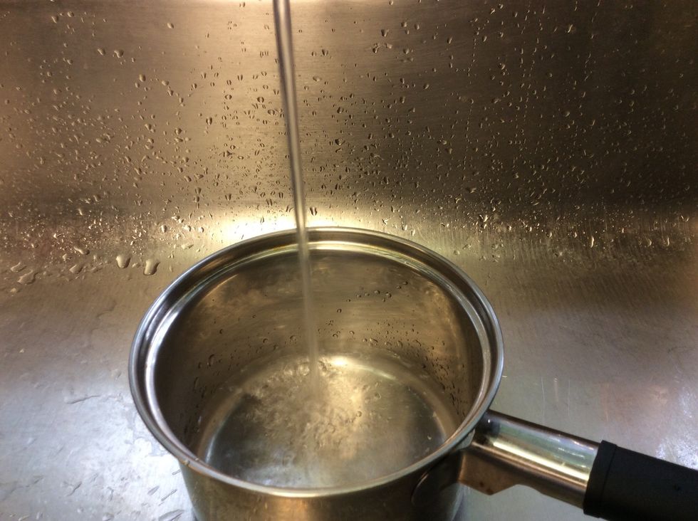 Fill your pot just above half with screaming hot water and bring to a boil.