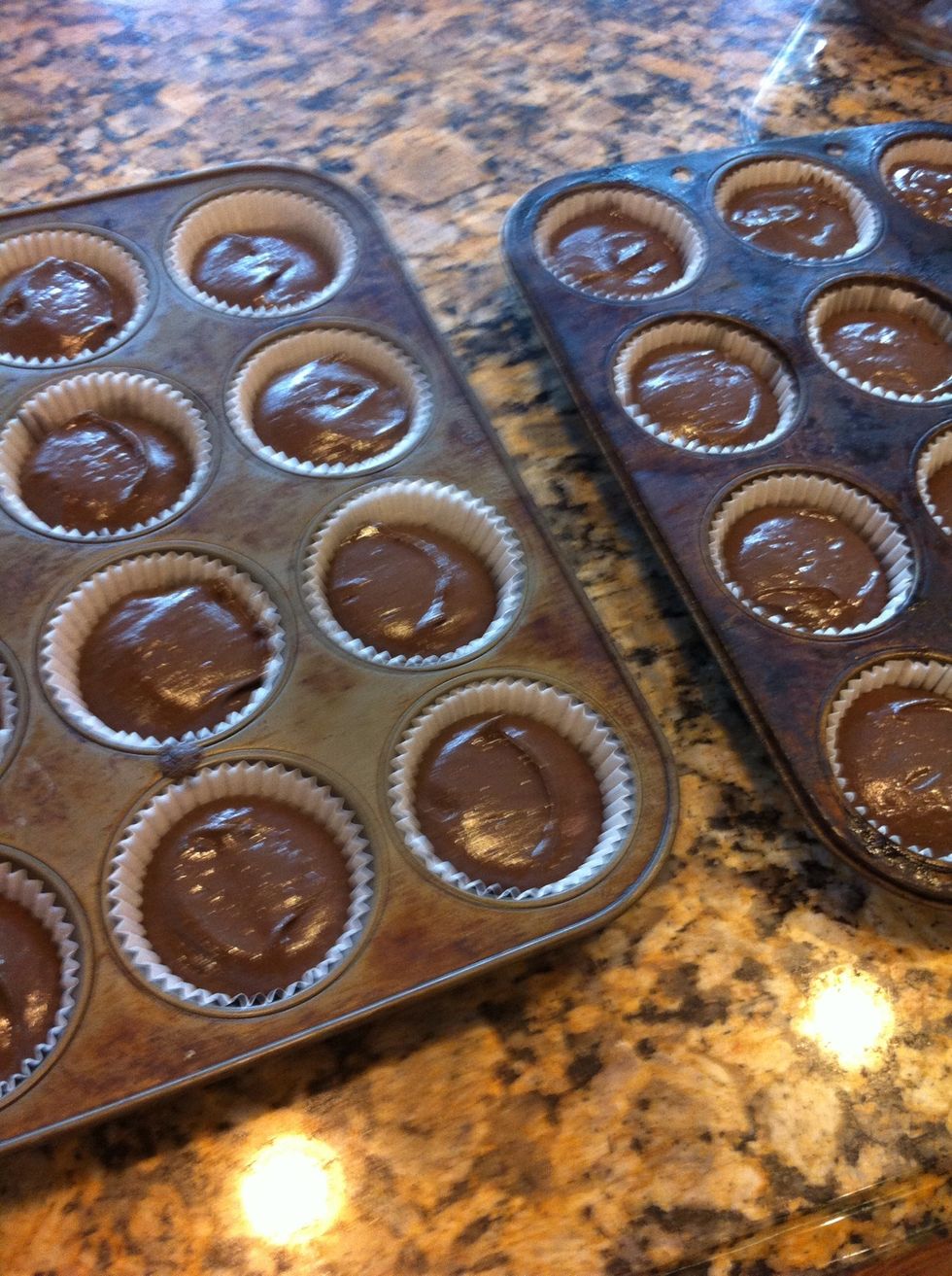 Fill your scooper slightly short of a full scoop. You don't want these to bake over the cups. Bake at 325, for about 23 minutes. You may need to let go longer. Start checking at that mark.