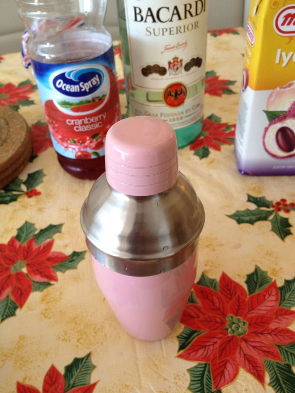 Fill your shaker half with ice cube