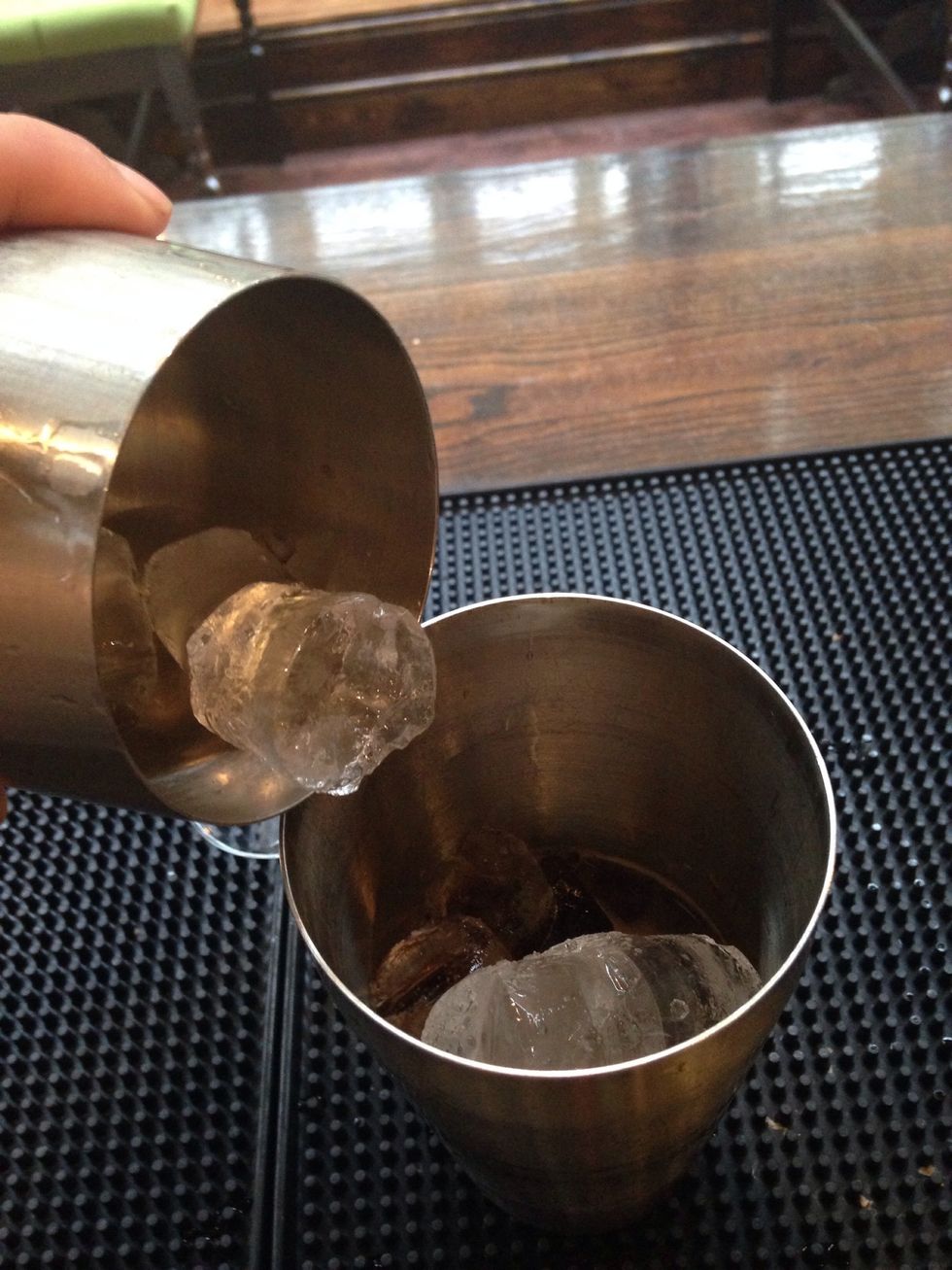 Fill your shaker to the top with ice and shake vigorously, getting as much air into the drink as possible. This will give it a thick ice creamy taste and layered appearance.