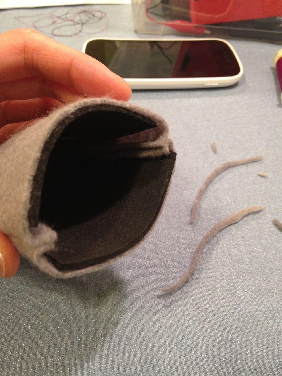 Final step is to finish the opening! You can fold the felt over the foam and hand sew to make a clean hem. But I kind of liked this grey and black layering and evened the felt up with the foam.