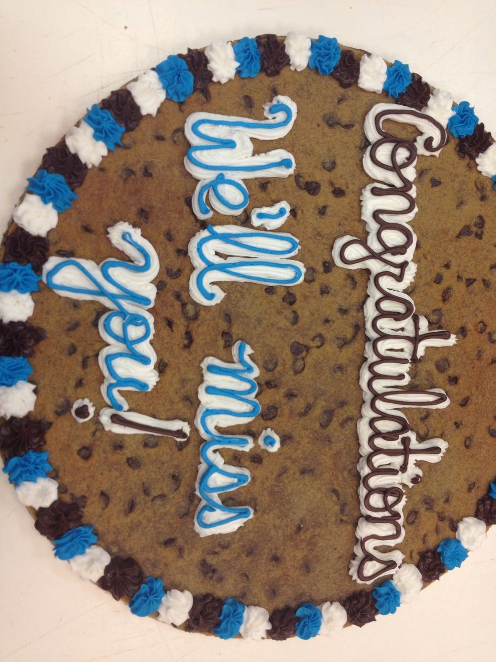 Final step take other color icing and use #6 tip and write on top with color.