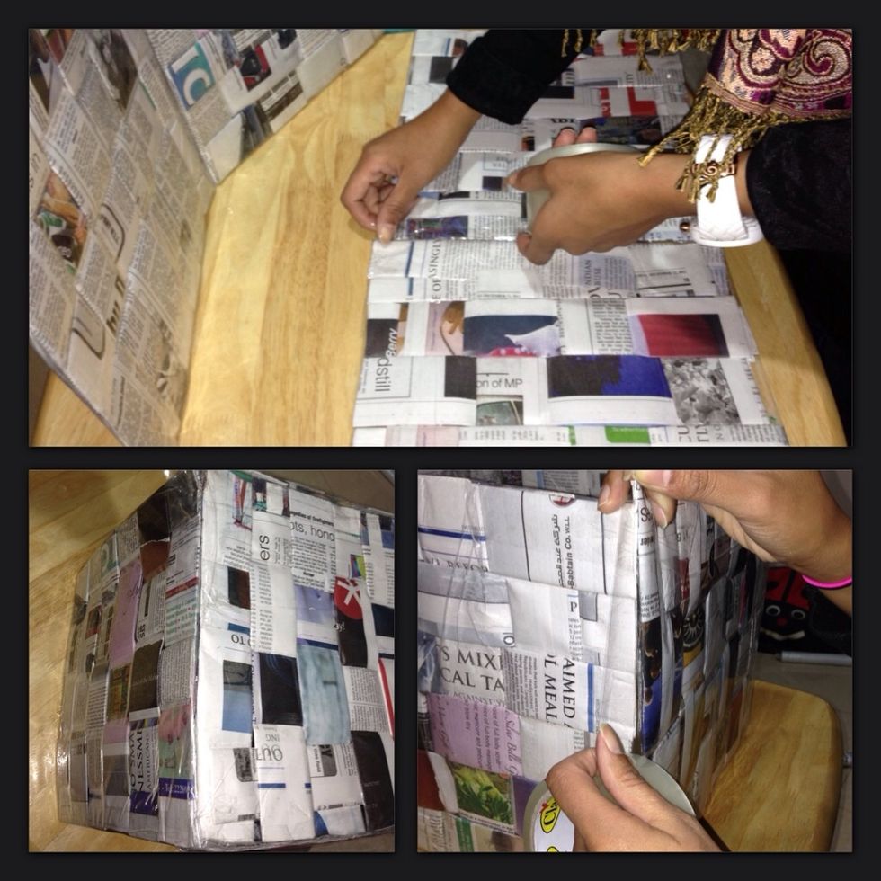 Final touches, tape the 4 squares all together around the base that we have