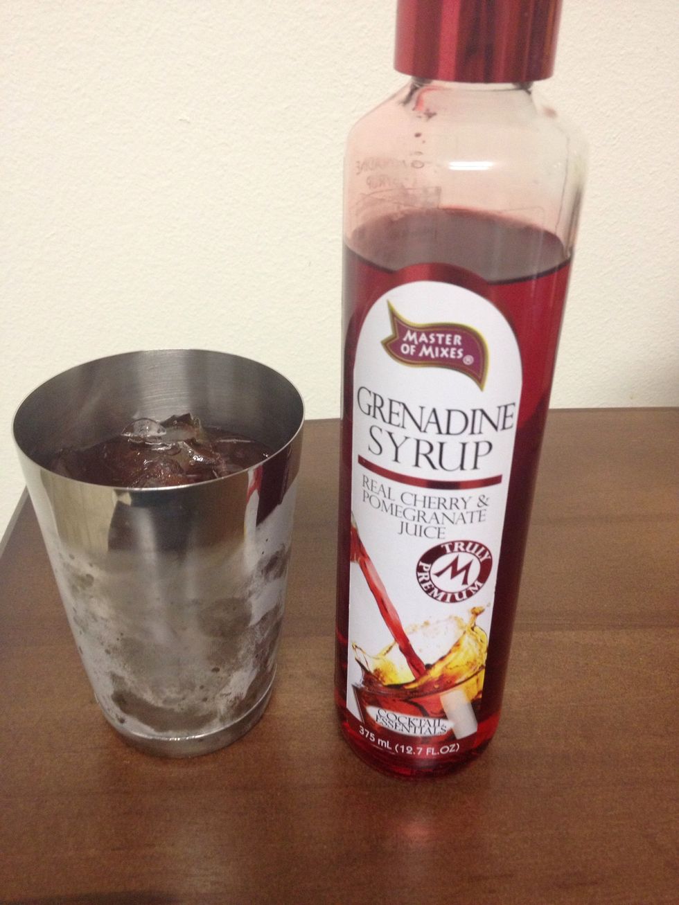 Finally, add a 1/2 ounce of Grenadine into the shaker. :)