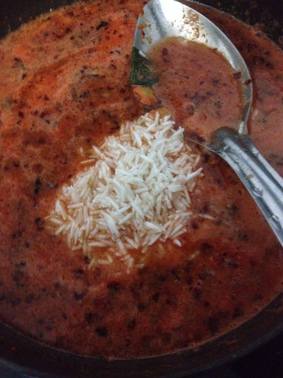 Finally add soaked rice into it