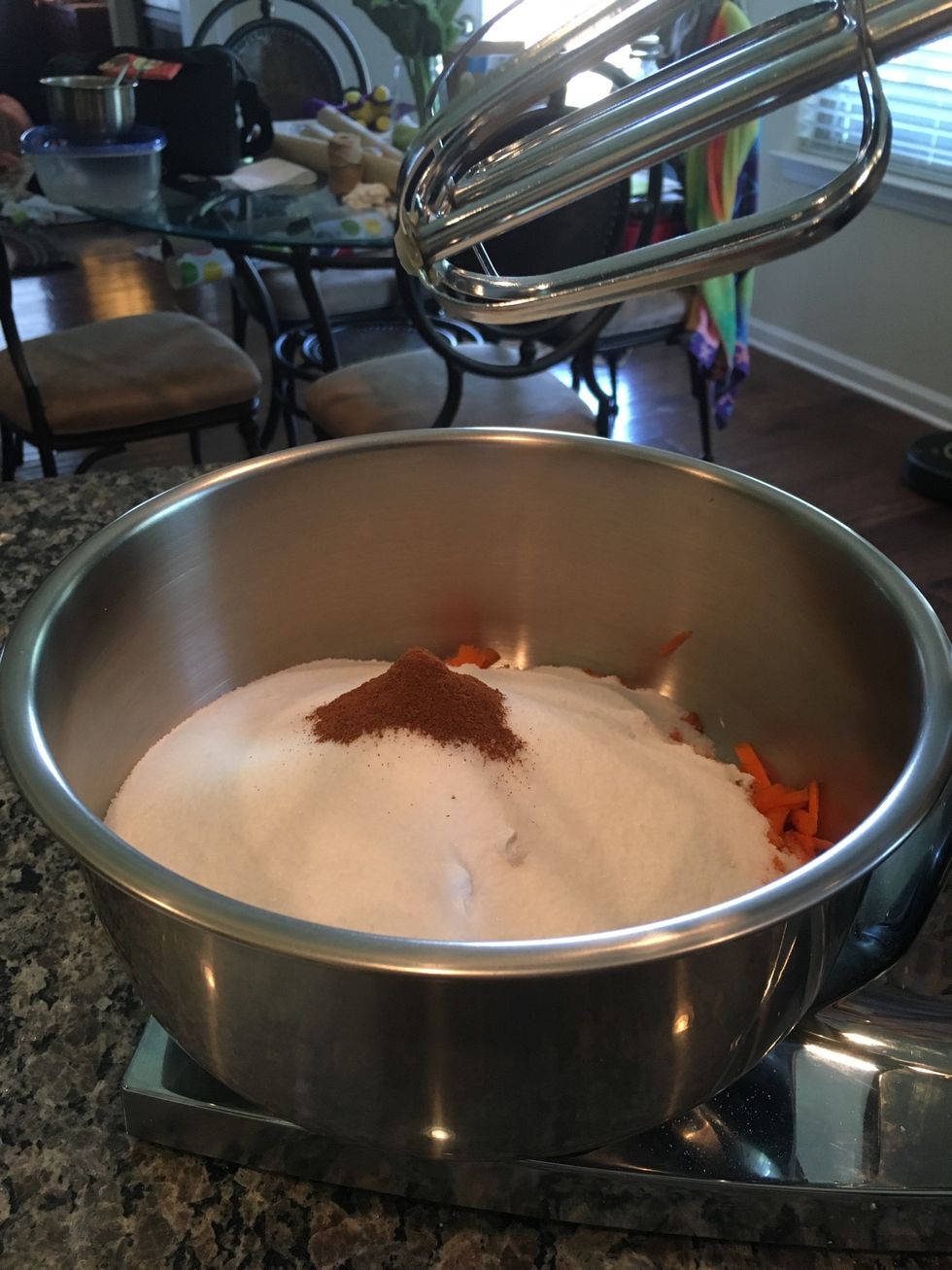 Finally, add the ground cinnamon to the mixing bowl with the previous 6 ingredients.
