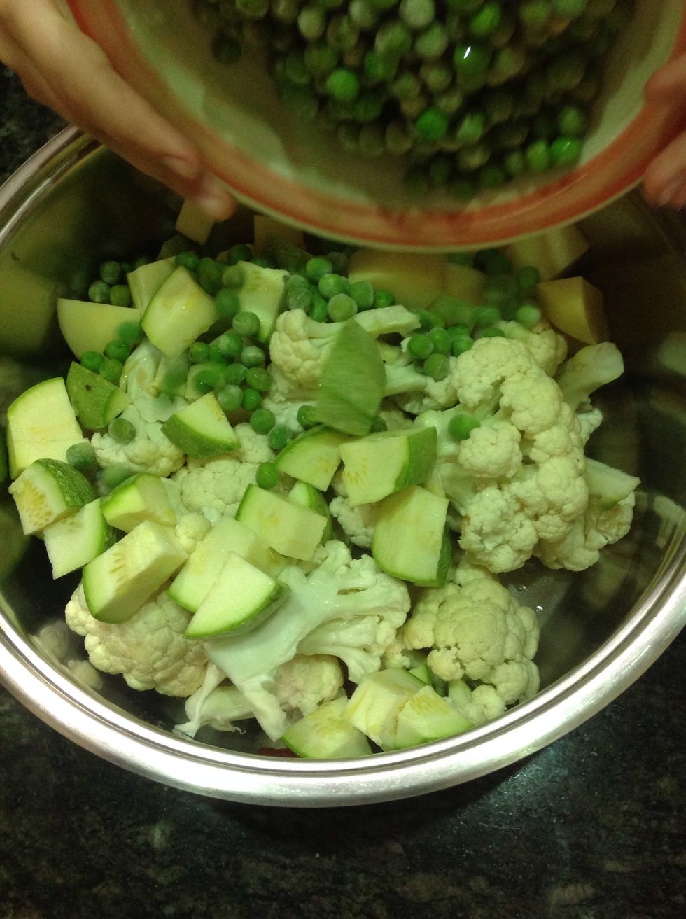 Finally add the peas.