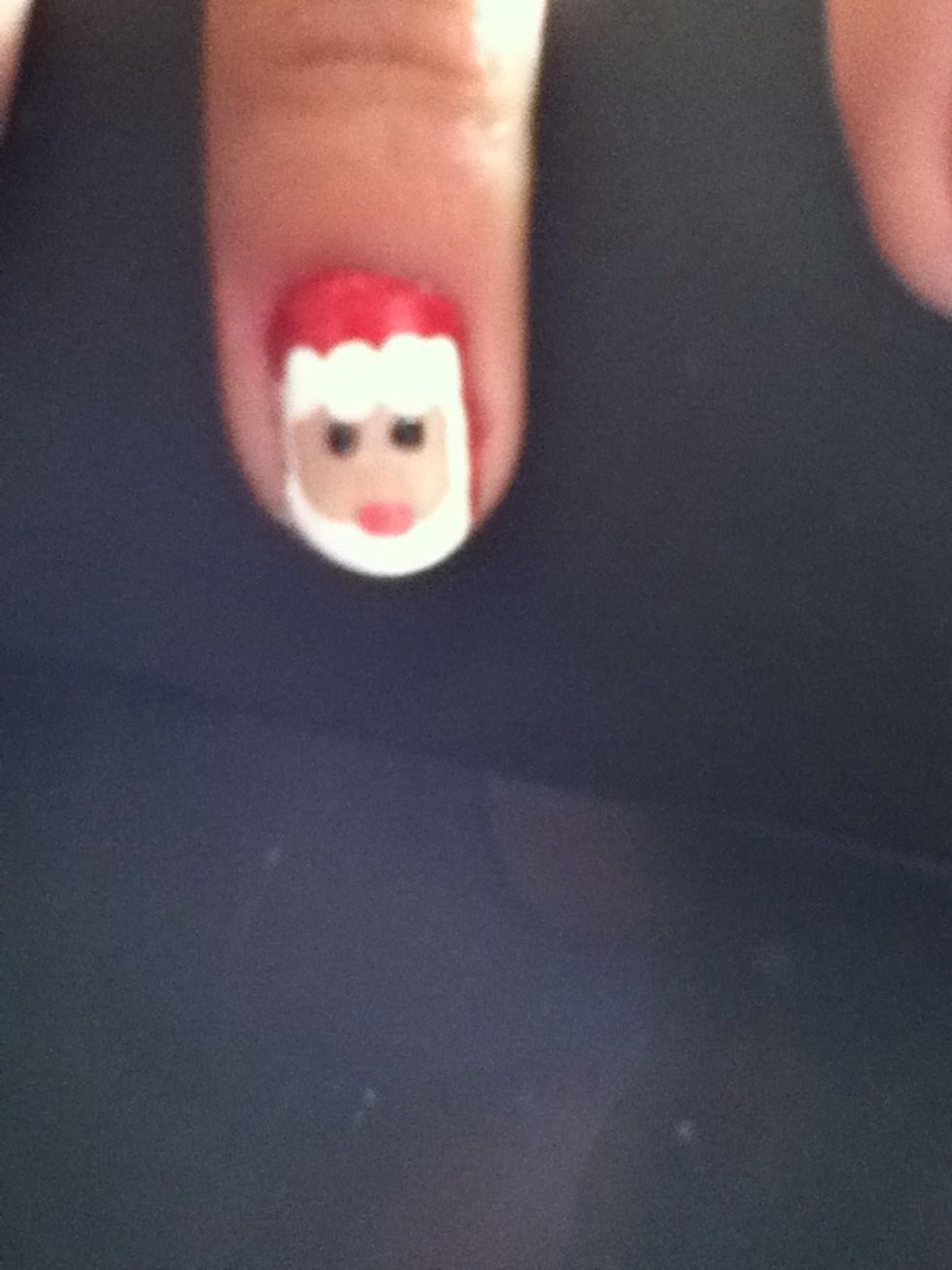 Finally add two small black dots for the eyes and a pink one for the nose